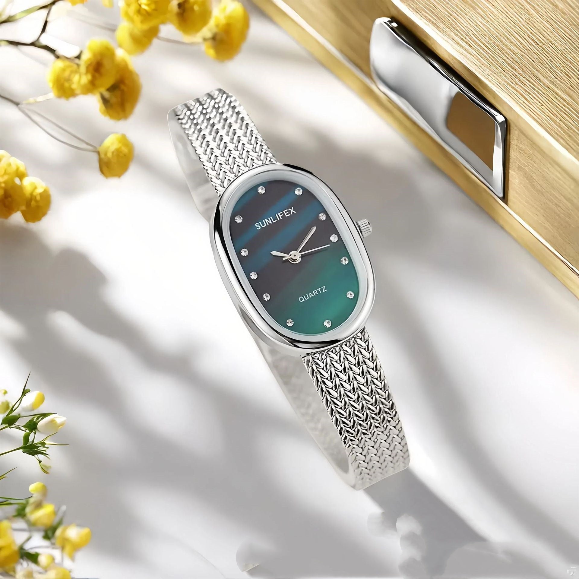 Gold Oval Dial Watch