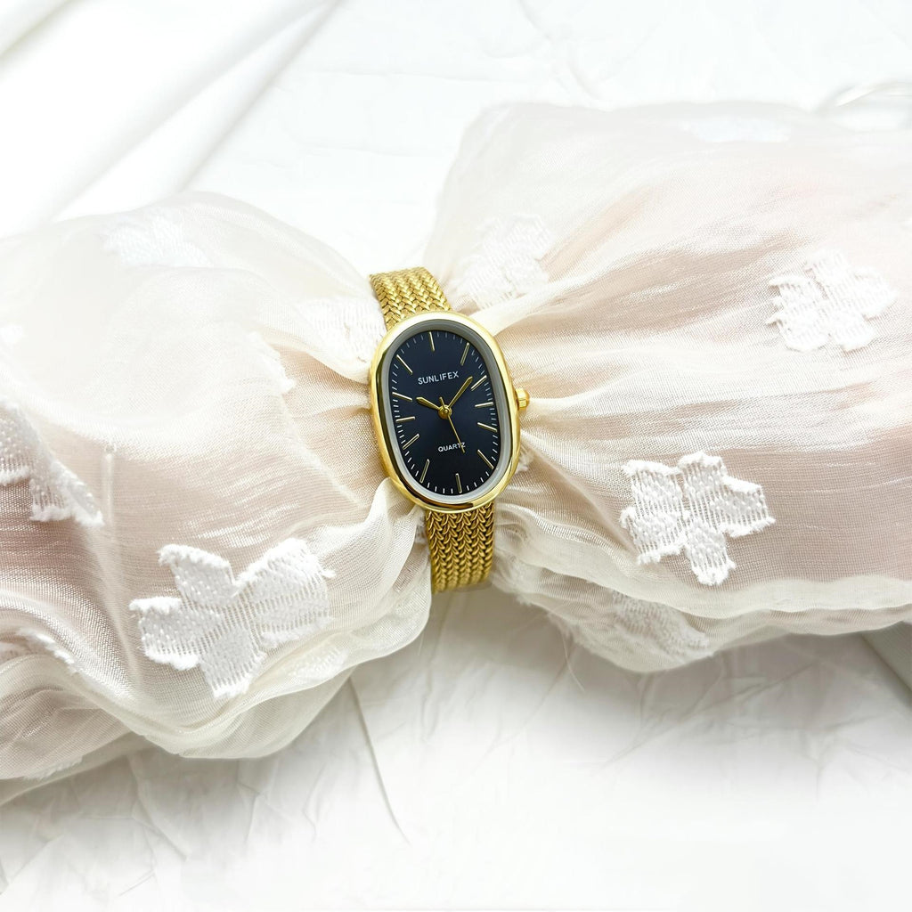 Gold Oval Dial Watch