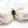 Gold Oval Dial Watch