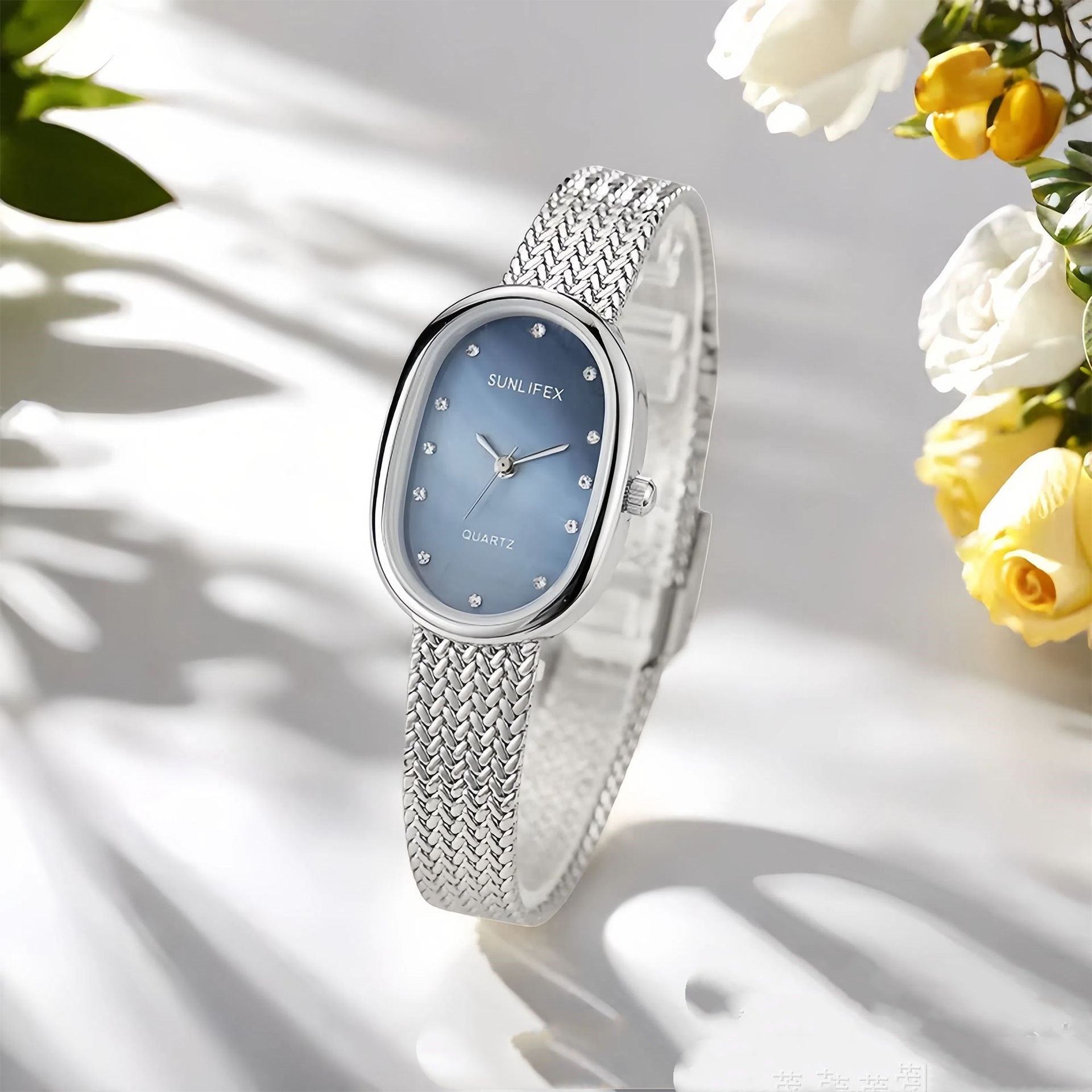 Gold Oval Dial Watch